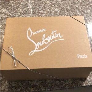 Christian Louboutin black pumps